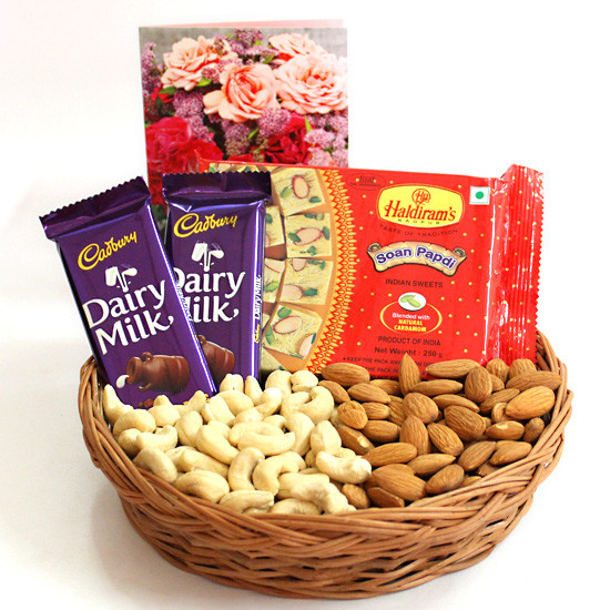 send Dairy Milk Soan Papdi 250 gms half kg Cashewnuts  Almonds in Basket delivery
