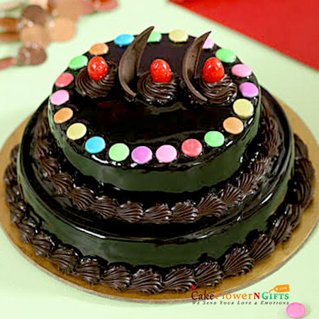 send 2 kg 2 tier chocolate gems cake delivery