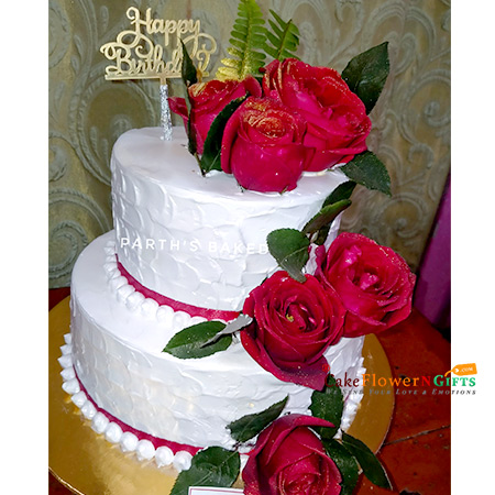 White wedding cake with red hearts on wedding party Stock Photo - Alamy